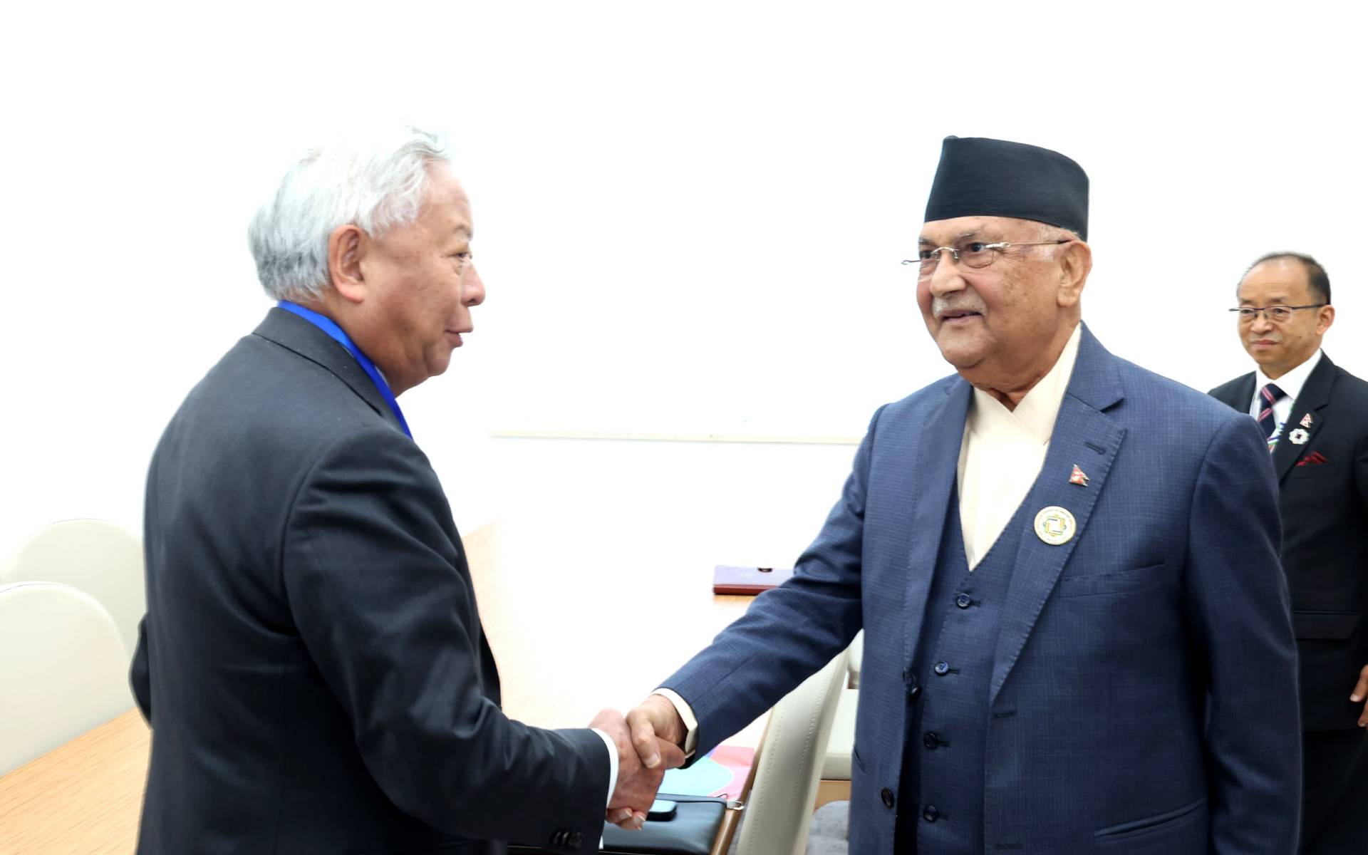 AIIB President Jin Limbunan Pays Courtesy Call on PM Oli