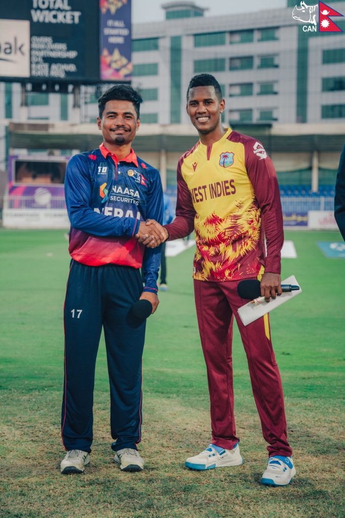 Skippers Rohit Kumar Paudel and Akeal Hosein.