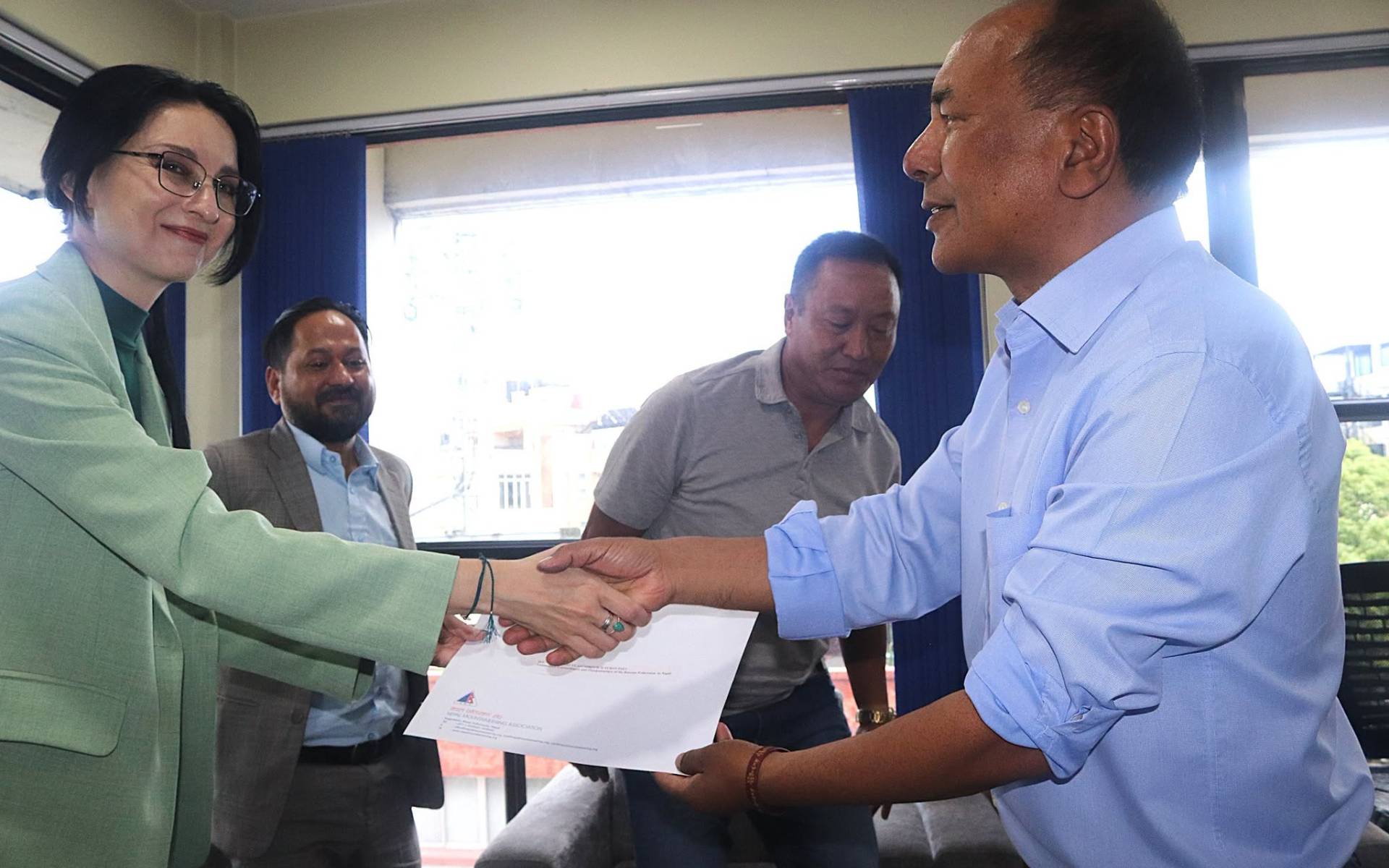 NMA President Sherpa Holds Meeting with Russian House Director Khokhlova
