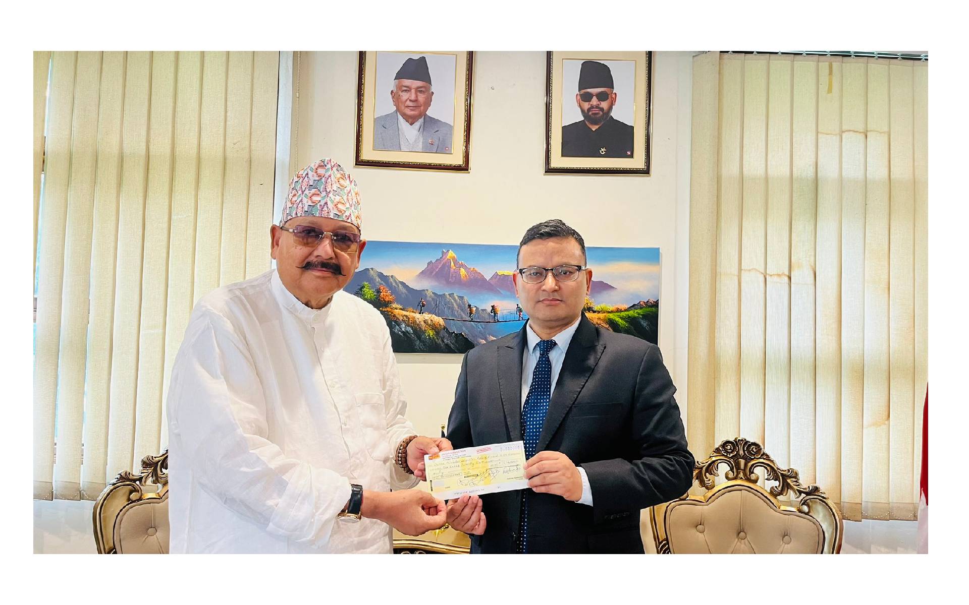 Uttarakhand Tourism Minister Maharaj Hands Over Check for Nepal’s Prime Minister Disaster Relief Fund 