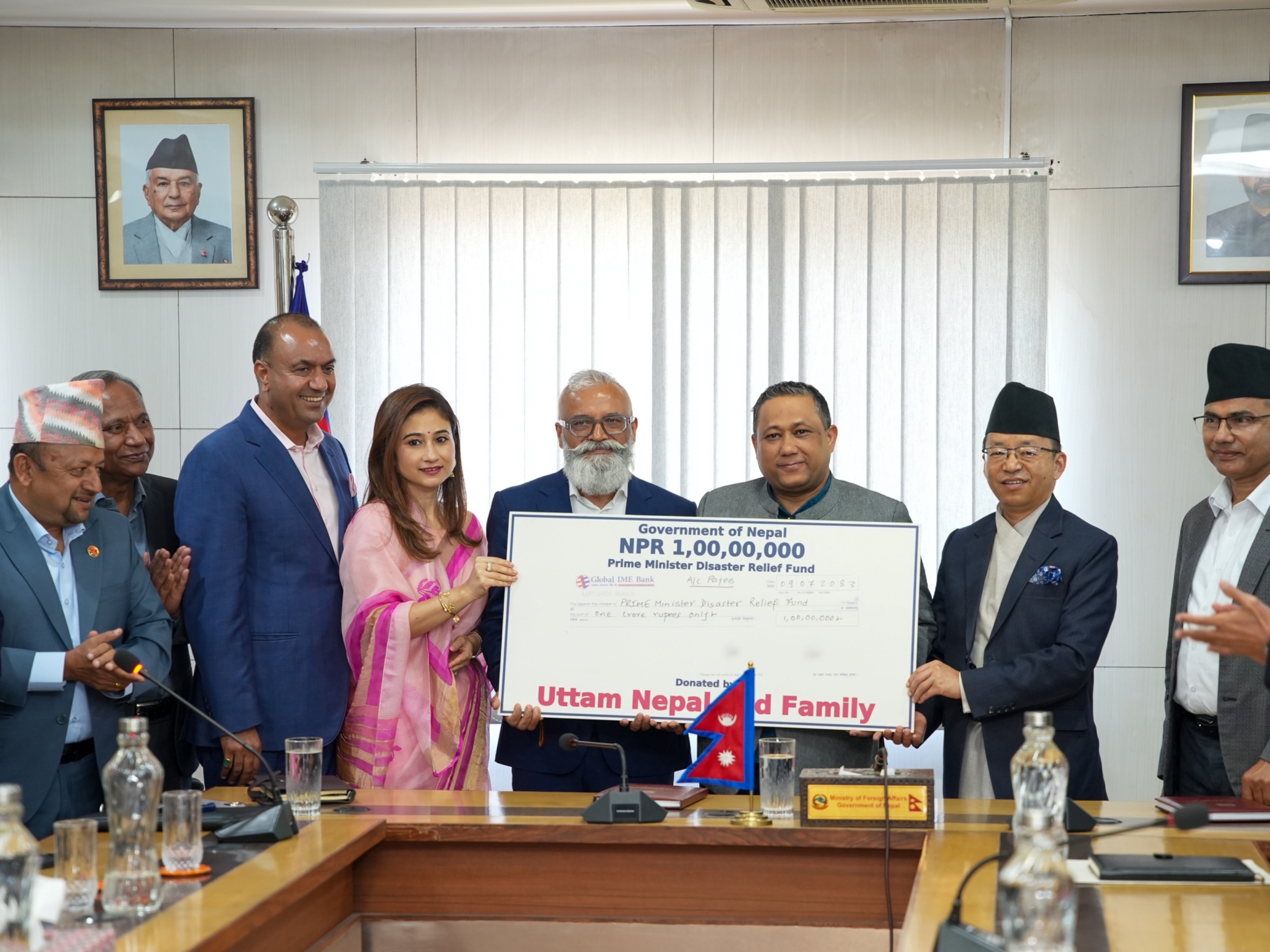 NRNA Leaders Hand Over DNA Testing Kits and NPR 10 Million to Government